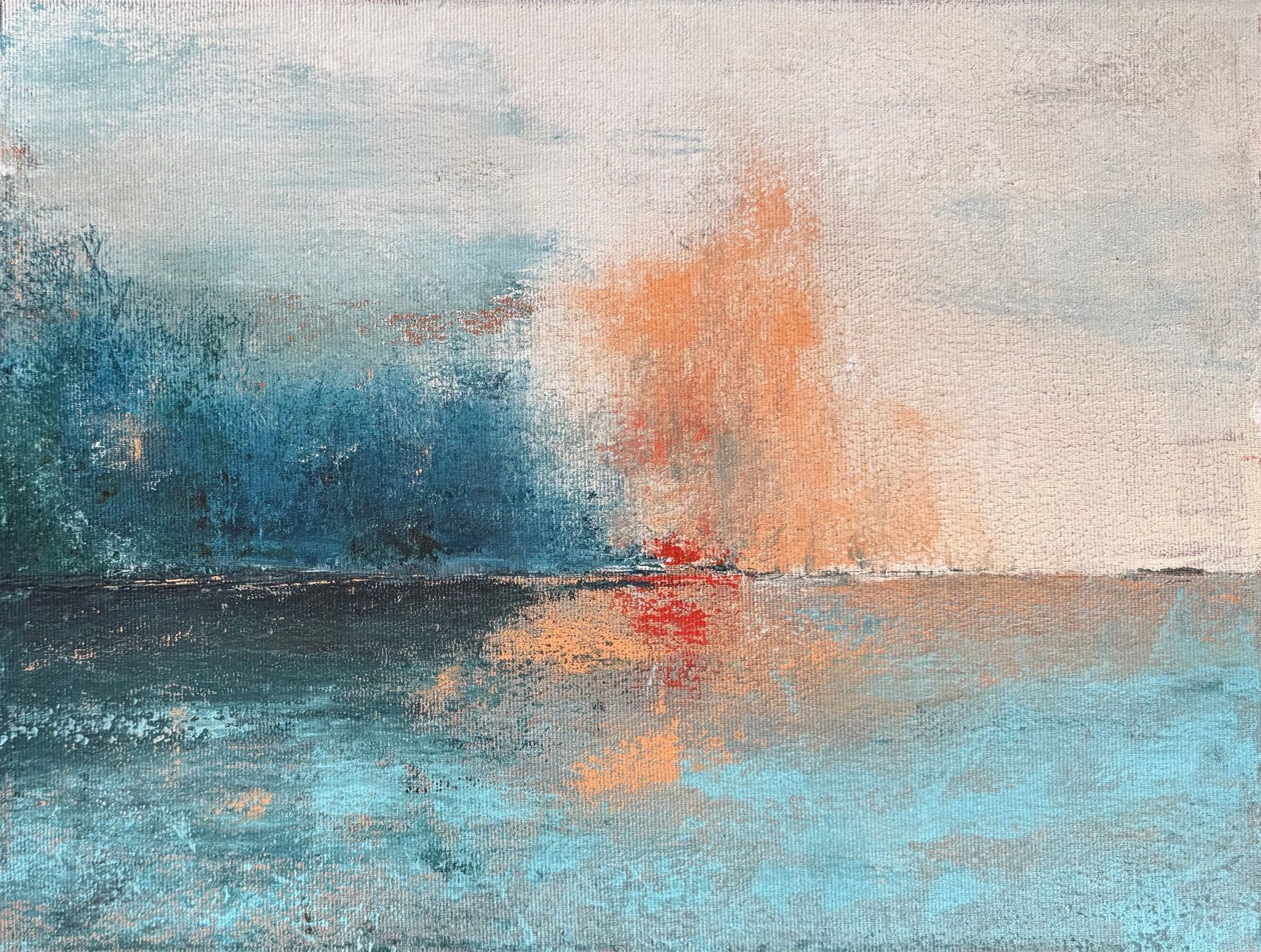 Abstract landscape with dark blue trees on the left, a soft orange burst in a pale sky and its reflection in blue water below a dark horizon.